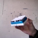 A box of Thoughtfaucet cards in a blue Moo display box